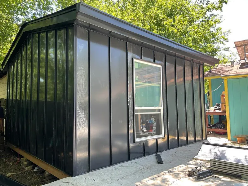 Black standing seam metal wall panels for Roof Inspection in Princeton